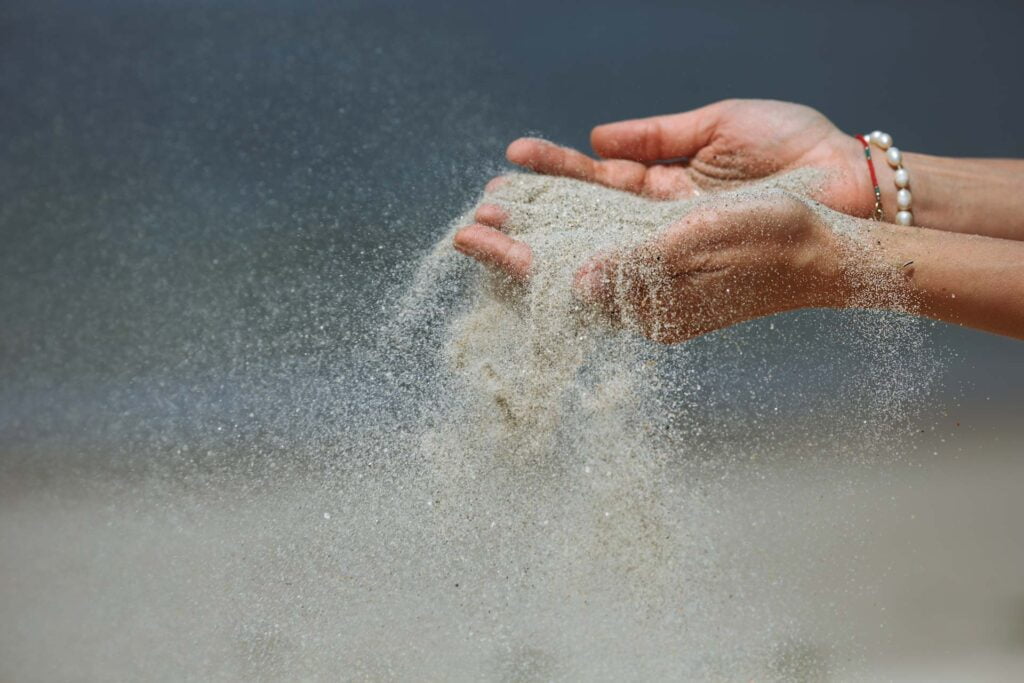 sand running trough hands